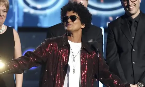 Bruno Mars sets new Billboard record, with some help from a famous friend