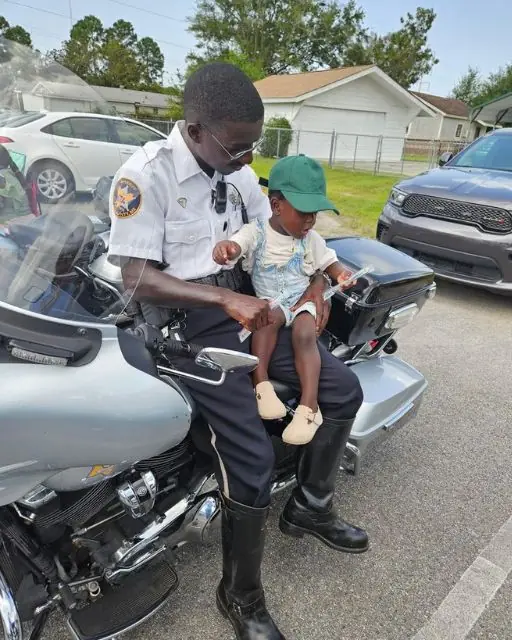 MY SON CLIMBED ON A POLICE MOTORCYCLE AND WHISPERED SOMETHING THAT LEFT THE OFFICER SPEECHLESS
