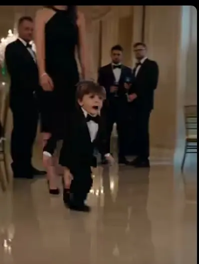 The mansion fell silent the moment the little boy appeared.